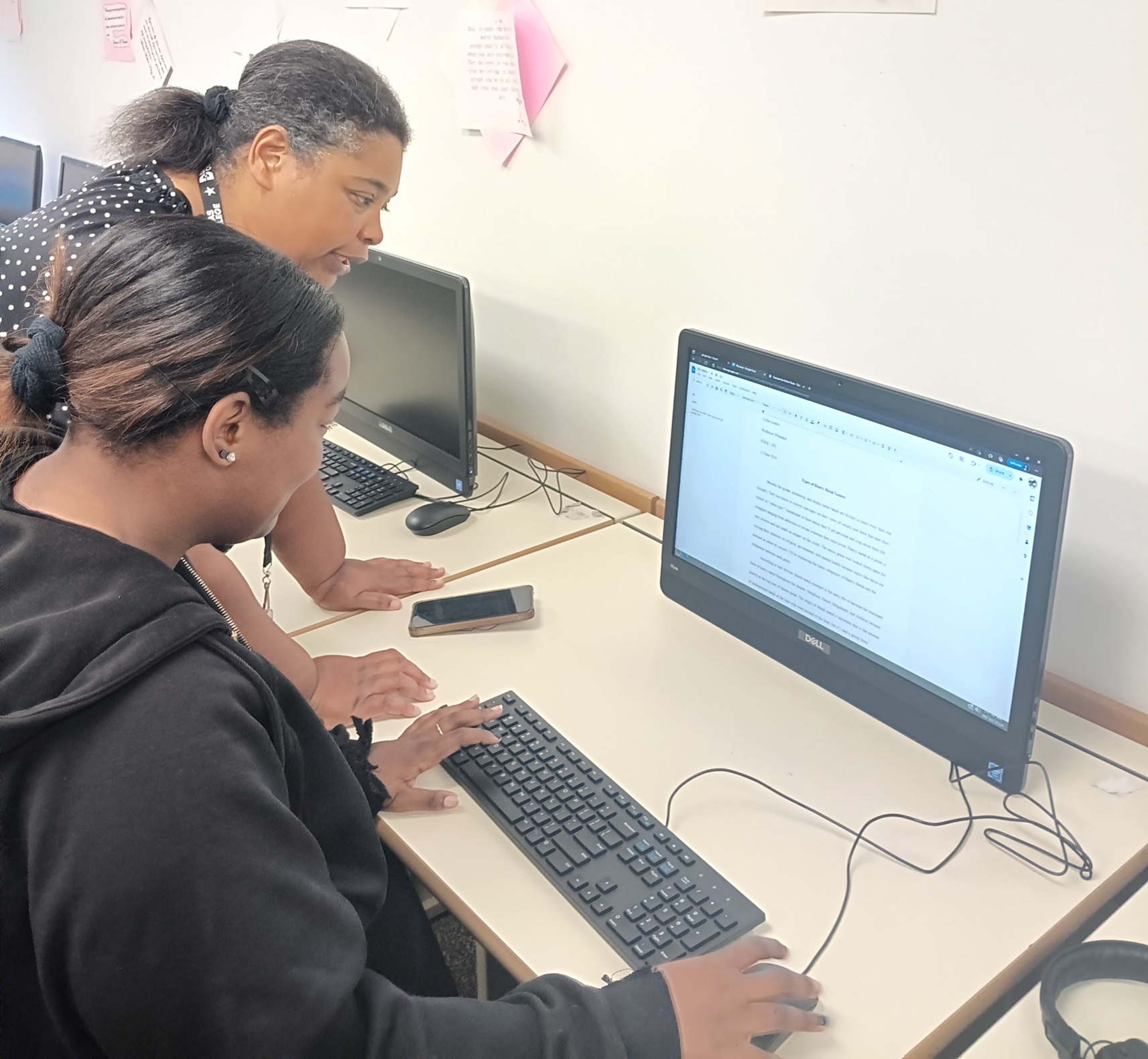 dallas high school student and teacher work at mastery academics high school